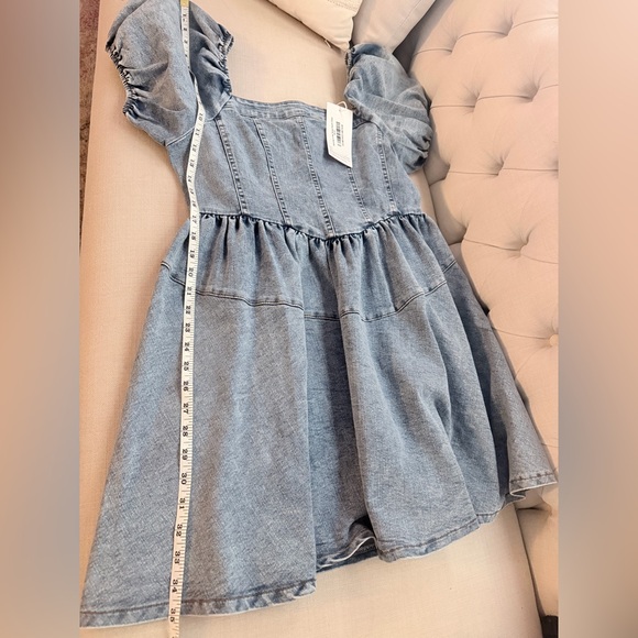 Denim Puff Sleeve Dress The fabric stretches a little. - Picture 5 of 9